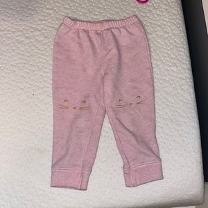 Pink pants with kitten detail on knee